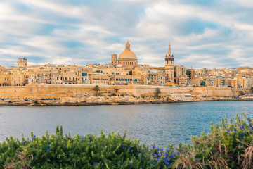 Fototapeta na wymiar Valletta, Malta old town skyline from Sliema city on the other side of harbor