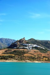 View across the reservoir towards the village (Embalse de Zahara), Zahara de la Sierra, Spain.