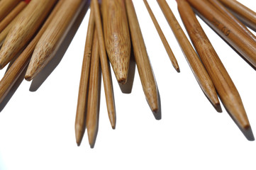 circular knitting needles from bamboo on a white background.