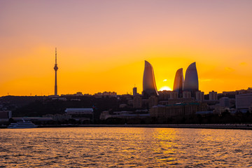Fototapeta na wymiar Night view of Baku with the Flame Towers skyscrapers