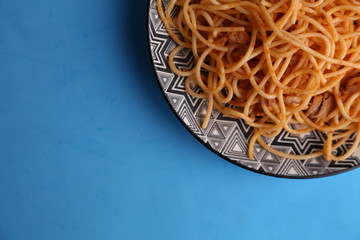 plate of spaghetti pasta with tomato