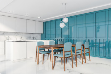 White and blue kitchen corner, counters and table