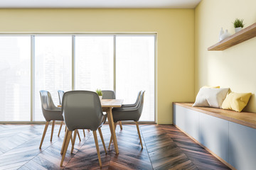 Yellow panoramic dining room with bench