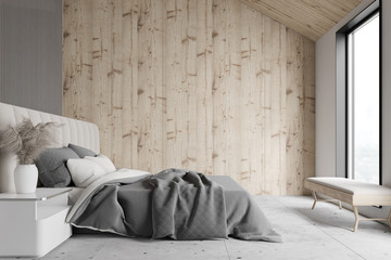 Wooden and gray attic bedroom interior