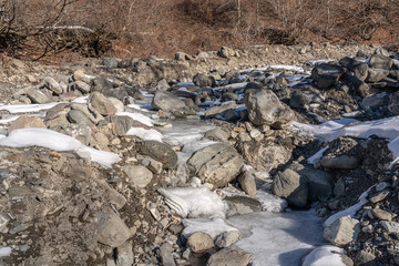 Channel of a frozen mountain river
