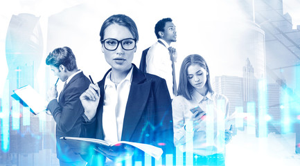 Diverse business partners in city, financial chart