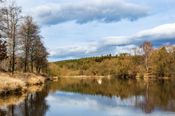 Fototapeta na wymiar Early spring landscape with Vltava river in South Bohemia.