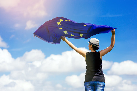 Young Woman Holding The European Union Flag. Voting Concept.