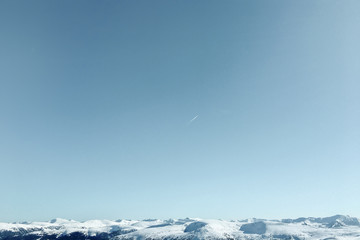 blue sky white airplane