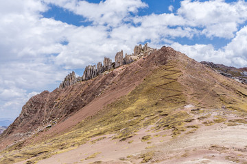 Climb up to the stone forest at the Palccoyo Rainbow Mountain near Cusco, Peru