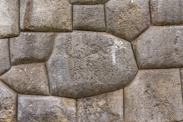 Stone wall constructed of huge boulders precisely carved by the inca's a the Sacsayhuamán...