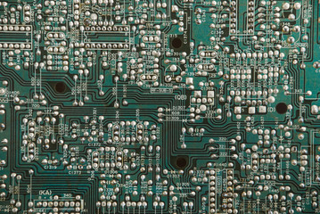 Chip green printed circuit board with the image of contacts