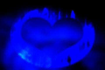 Black and blue background with heart elements