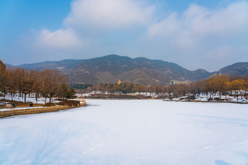 Chengjing lake of Beijing Botanical Garden after snow in winter. 