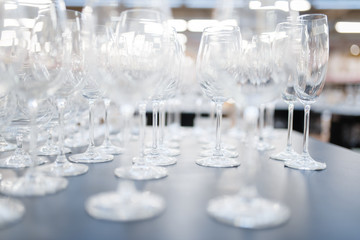 Wine glasses on the shelf closeup, houseware store