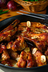 Spicy pork ribs with garlic and barbecue sauce