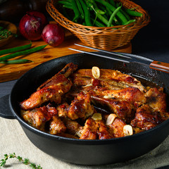 Spicy pork ribs with garlic and barbecue sauce