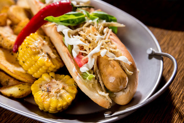 Hotdogs and French fries on a dishes. Fast food meal. Restaurant.