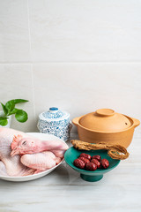 Chinese nutritious health soup ingredients, fresh hen and red date angelica