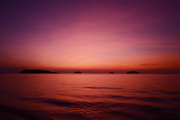 Beautiful sunset at the beach in the tropics. Sky and ocean