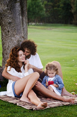 Happy young family in the park