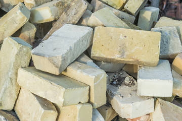 A bunch of yellow brick for the construction of a full 