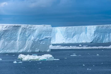 Foto auf Acrylglas Antarktis Navigating among enormous icebergs, including the world's largest recorded B-15, calved from the Ross Ice Shelf of Antarctica,
