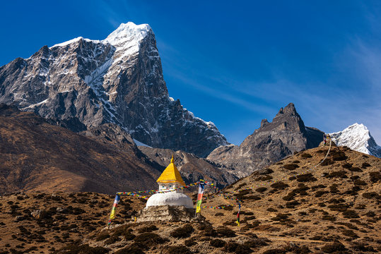 Stupa near Dingboche village with prayer flags - way to mount Everest base camp - Khumbu valley - Nepal