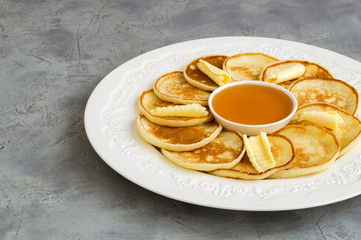 pancakes with butter and honey.