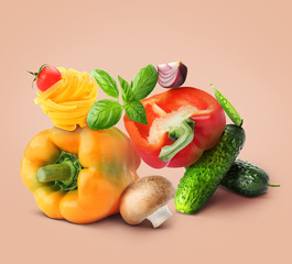Assortment of fresh vegetables with pasta on color background