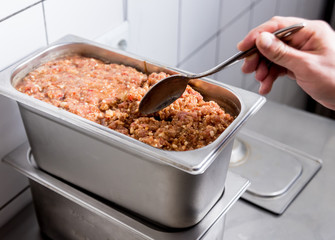 Chef coocking georgian khinkali or japanese wonton. 