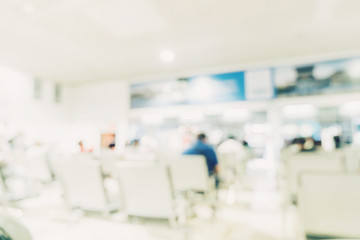 abstract blur background of people sitting and walking in hospital.