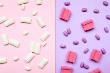 Different chewing gums on color background