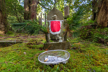 Jizo Statue in Ancient Graveyard of Okunoin Cemetery, Koyasan, Japan.