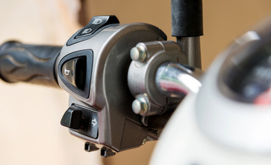 Closeup Horn switches and turn signals motorcycle. Selective focus.