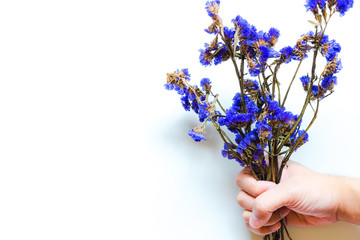 Man hand holding beautiful flowers in white background for special event