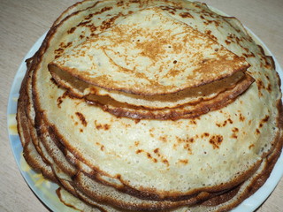 a stack of fried pancakes on a plate