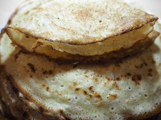 a stack of fried pancakes on a plate