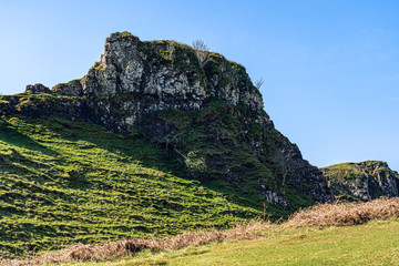 View from the Fairy Glen on the Isle of Skye, Scotland, on a sunny blue sky day.