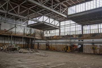 Interior of an abandoned industrial workshop. MIG Aircraft Building Plant in Moscow, Russia