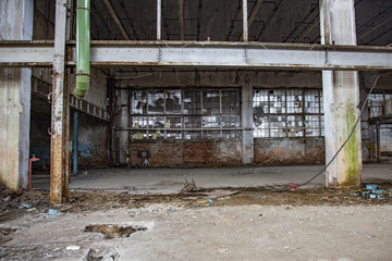 Fototapeta Interior of an abandoned industrial workshop. MIG Aircraft Building Plant in Moscow, Russia obraz