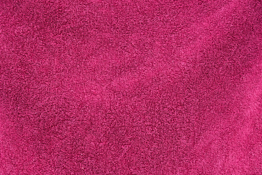 Close up soft pink towel for background. Close up pink fabric for backdrop and background.