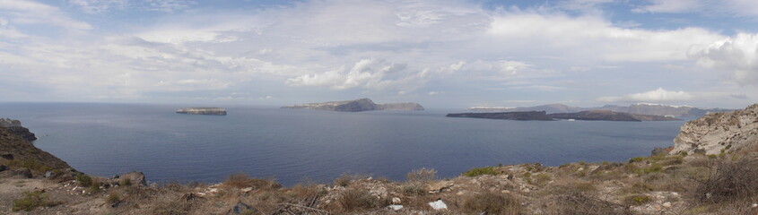 Panoramic views of the caldera, mountains, the Mediterranean Sea, and the city of Fira from the Akrotiri Lighthouse.
