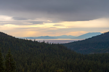 Forests, lake and storm clouds seen from Crater Lake