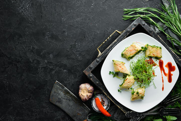 Chicken rolls with spinach and cheese. Top view. Free space for your text.