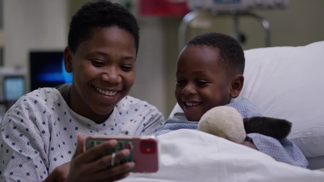 Mother and Child in Hospital Room Happy Close Up 60fps