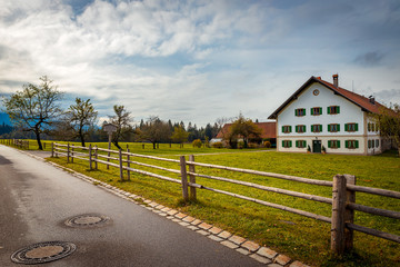 Traditional white house in the countryside of Bavaria, Germany