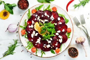 Beet vegetable salad with feta cheese. Food. Top view. Free space for your text.