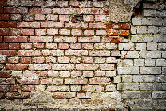 Old brick and plaster wall texture background © Taigi