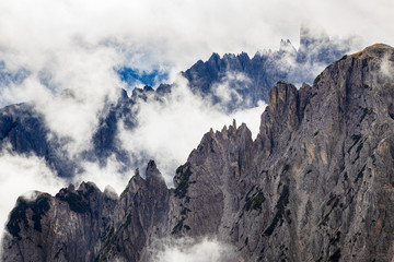 Rocky mountains in Italy with cloudy sky, Dolomites, Tre Cime di Lavaredo